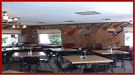 An Immaculate Dining Area With College Banners An Attention Getter...